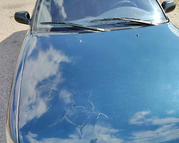 Синий Тойота Королла, объемом двигателя 2 л и пробегом 320 тыс. км за 2000 $, фото 13 на Automoto.ua