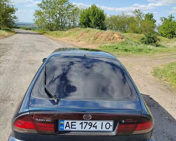 Синий Тойота Королла, объемом двигателя 2 л и пробегом 320 тыс. км за 2000 $, фото 12 на Automoto.ua