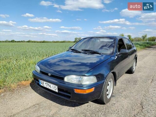 Синий Тойота Королла, объемом двигателя 2 л и пробегом 320 тыс. км за 2000 $, фото 4 на Automoto.ua