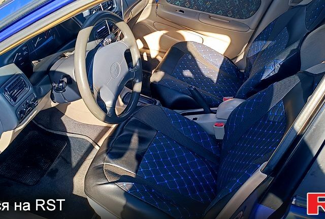 Синий Тойота Королла, объемом двигателя 1.6 л и пробегом 350 тыс. км за 3200 $, фото 2 на Automoto.ua