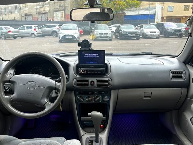 Синий Тойота Королла, объемом двигателя 1.3 л и пробегом 355 тыс. км за 2700 $, фото 4 на Automoto.ua