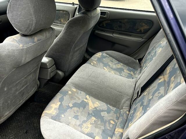 Синий Тойота Королла, объемом двигателя 1.3 л и пробегом 355 тыс. км за 2700 $, фото 5 на Automoto.ua