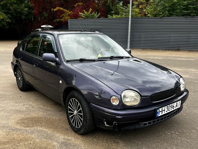 Синий Тойота Королла, объемом двигателя 1.3 л и пробегом 355 тыс. км за 2700 $, фото 1 на Automoto.ua