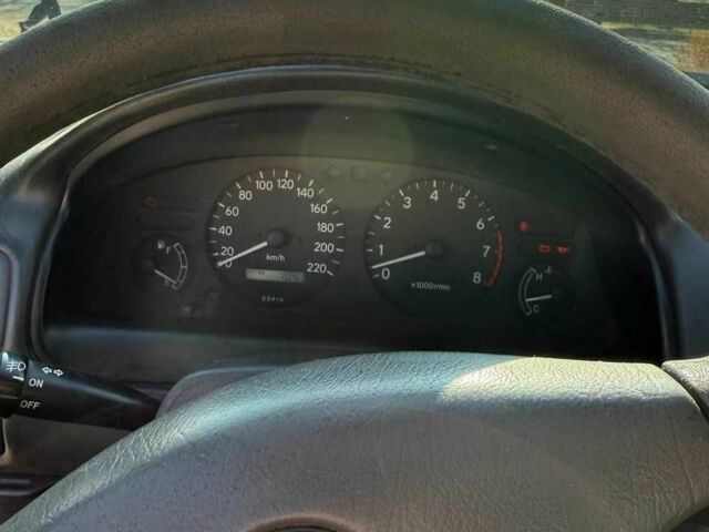 Синій Тойота Королла, об'ємом двигуна 1.4 л та пробігом 395 тис. км за 3100 $, фото 5 на Automoto.ua