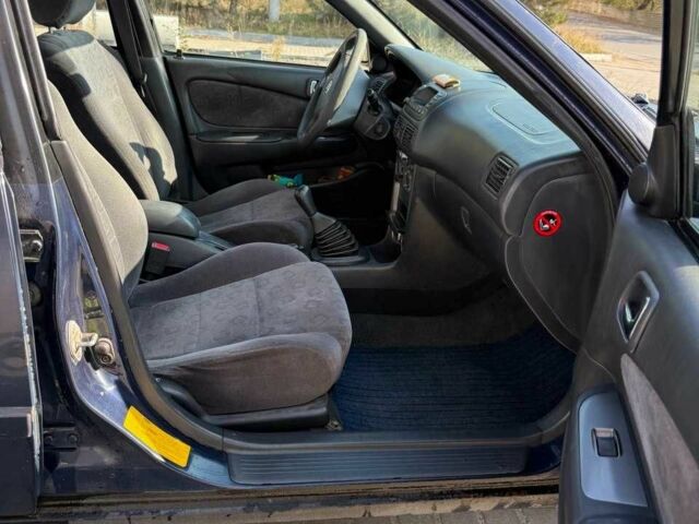 Синій Тойота Королла, об'ємом двигуна 1.4 л та пробігом 395 тис. км за 3100 $, фото 8 на Automoto.ua