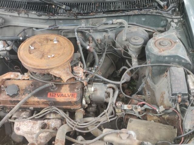 Зеленый Тойота Королла, объемом двигателя 1.3 л и пробегом 200 тыс. км за 400 $, фото 1 на Automoto.ua