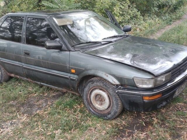 Зеленый Тойота Королла, объемом двигателя 1.3 л и пробегом 200 тыс. км за 400 $, фото 2 на Automoto.ua