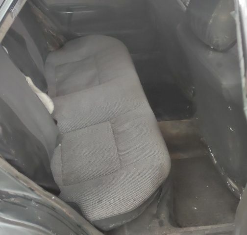 Зеленый Тойота Королла, объемом двигателя 1.3 л и пробегом 200 тыс. км за 400 $, фото 6 на Automoto.ua