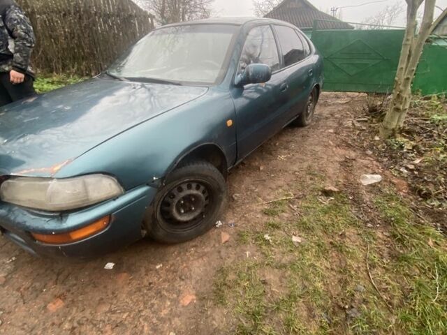 Зелений Тойота Королла, об'ємом двигуна 1.3 л та пробігом 369 тис. км за 900 $, фото 8 на Automoto.ua