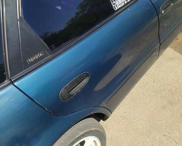 Зелений Тойота Королла, об'ємом двигуна 2.02 л та пробігом 400 тис. км за 1200 $, фото 2 на Automoto.ua