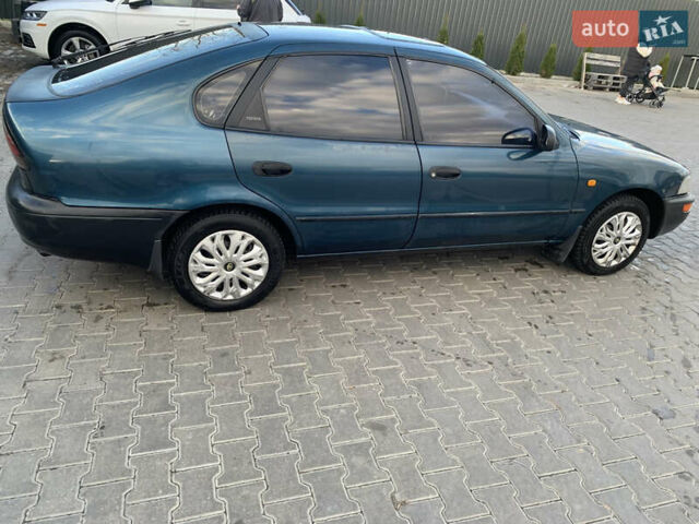 Зелений Тойота Королла, об'ємом двигуна 1.4 л та пробігом 294 тис. км за 2200 $, фото 4 на Automoto.ua