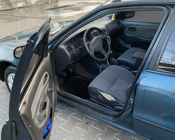 Зелений Тойота Королла, об'ємом двигуна 1.4 л та пробігом 294 тис. км за 2200 $, фото 7 на Automoto.ua