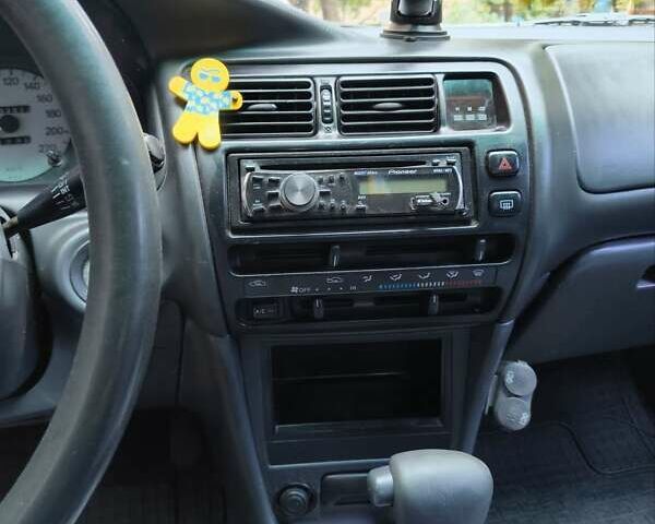 Зеленый Тойота Королла, объемом двигателя 1.3 л и пробегом 400 тыс. км за 2500 $, фото 15 на Automoto.ua