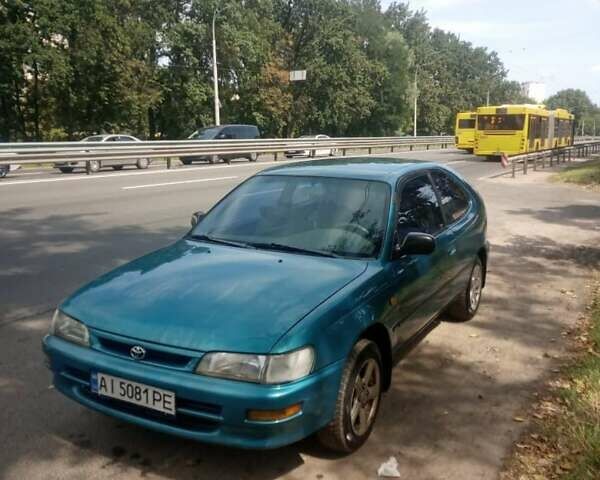 Зеленый Тойота Королла, объемом двигателя 1.3 л и пробегом 400 тыс. км за 2500 $, фото 14 на Automoto.ua