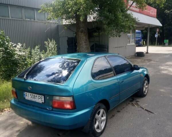 Зеленый Тойота Королла, объемом двигателя 1.3 л и пробегом 400 тыс. км за 2500 $, фото 6 на Automoto.ua