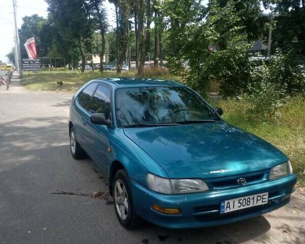 Зеленый Тойота Королла, объемом двигателя 1.3 л и пробегом 400 тыс. км за 2500 $, фото 7 на Automoto.ua