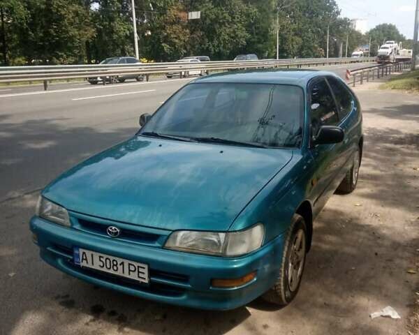 Зеленый Тойота Королла, объемом двигателя 1.3 л и пробегом 400 тыс. км за 2500 $, фото 5 на Automoto.ua