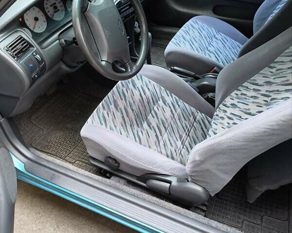 Зеленый Тойота Королла, объемом двигателя 1.3 л и пробегом 400 тыс. км за 2500 $, фото 12 на Automoto.ua