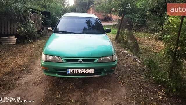 Зелений Тойота Королла, об'ємом двигуна 1.3 л та пробігом 250 тис. км за 1700 $, фото 9 на Automoto.ua