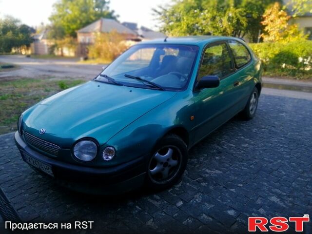 Зелений Тойота Королла, об'ємом двигуна 1.3 л та пробігом 215 тис. км за 1850 $, фото 2 на Automoto.ua