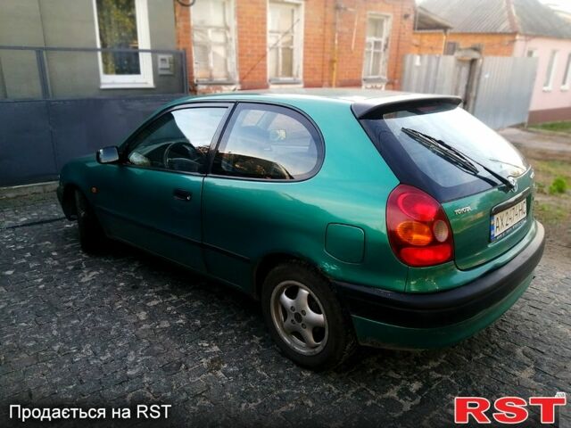 Зелений Тойота Королла, об'ємом двигуна 1.3 л та пробігом 215 тис. км за 1850 $, фото 1 на Automoto.ua