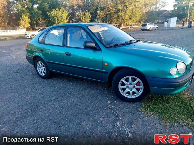 Зеленый Тойота Королла, объемом двигателя 1.6 л и пробегом 370 тыс. км за 3500 $, фото 3 на Automoto.ua