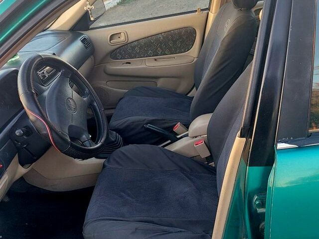 Зеленый Тойота Королла, объемом двигателя 1.6 л и пробегом 370 тыс. км за 3500 $, фото 7 на Automoto.ua