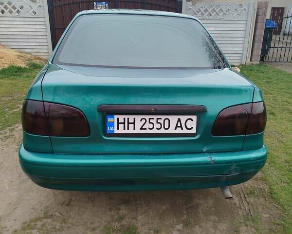 Зеленый Тойота Королла, объемом двигателя 1.6 л и пробегом 475 тыс. км за 2600 $, фото 4 на Automoto.ua