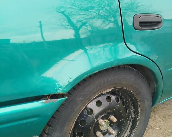 Зеленый Тойота Королла, объемом двигателя 1.6 л и пробегом 475 тыс. км за 2600 $, фото 6 на Automoto.ua