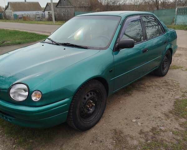 Зеленый Тойота Королла, объемом двигателя 1.6 л и пробегом 475 тыс. км за 2600 $, фото 1 на Automoto.ua