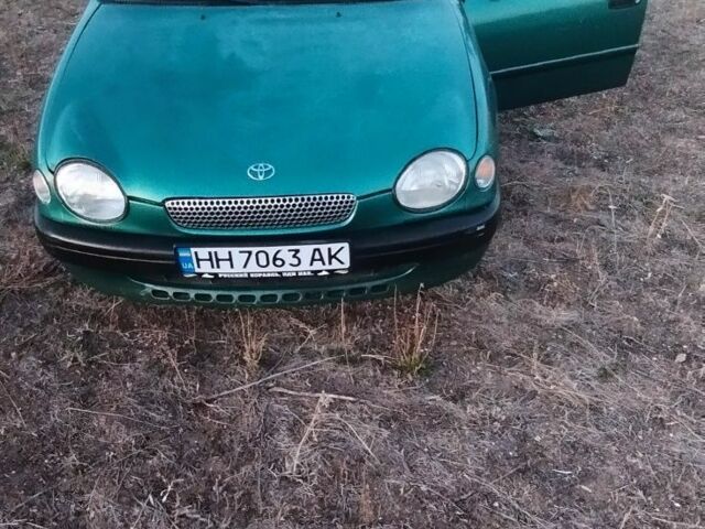 Зеленый Тойота Королла, объемом двигателя 1 л и пробегом 290 тыс. км за 2800 $, фото 1 на Automoto.ua