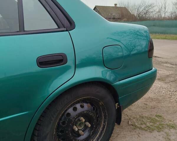 Зеленый Тойота Королла, объемом двигателя 1.6 л и пробегом 475 тыс. км за 2600 $, фото 3 на Automoto.ua