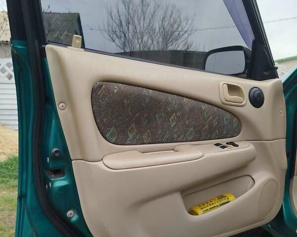 Зеленый Тойота Королла, объемом двигателя 1.6 л и пробегом 475 тыс. км за 2600 $, фото 11 на Automoto.ua