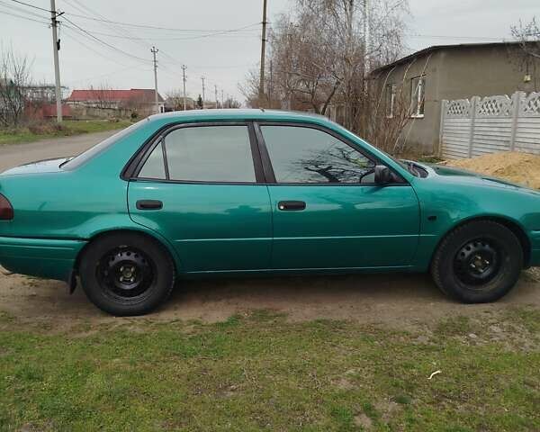 Зеленый Тойота Королла, объемом двигателя 1.6 л и пробегом 475 тыс. км за 2600 $, фото 8 на Automoto.ua