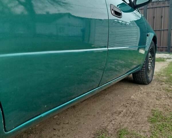 Зеленый Тойота Королла, объемом двигателя 1.6 л и пробегом 475 тыс. км за 2600 $, фото 7 на Automoto.ua