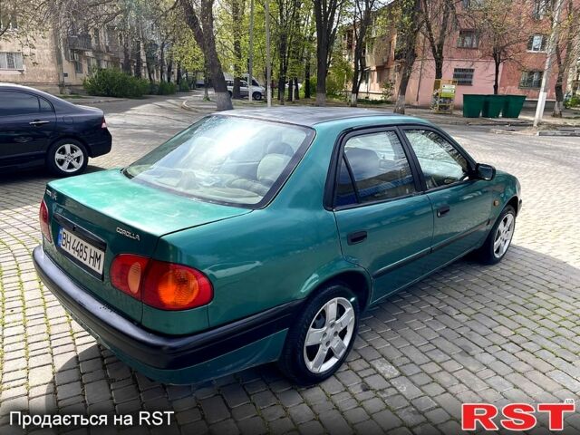 Зеленый Тойота Королла, объемом двигателя 1.3 л и пробегом 290 тыс. км за 1750 $, фото 2 на Automoto.ua