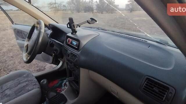 Зеленый Тойота Королла, объемом двигателя 1 л и пробегом 290 тыс. км за 2800 $, фото 4 на Automoto.ua