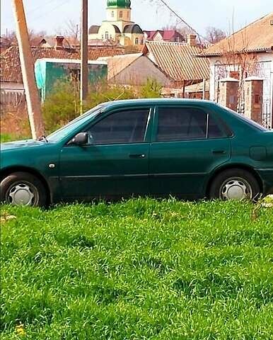 Зеленый Тойота Королла, объемом двигателя 1.4 л и пробегом 400 тыс. км за 4800 $, фото 1 на Automoto.ua