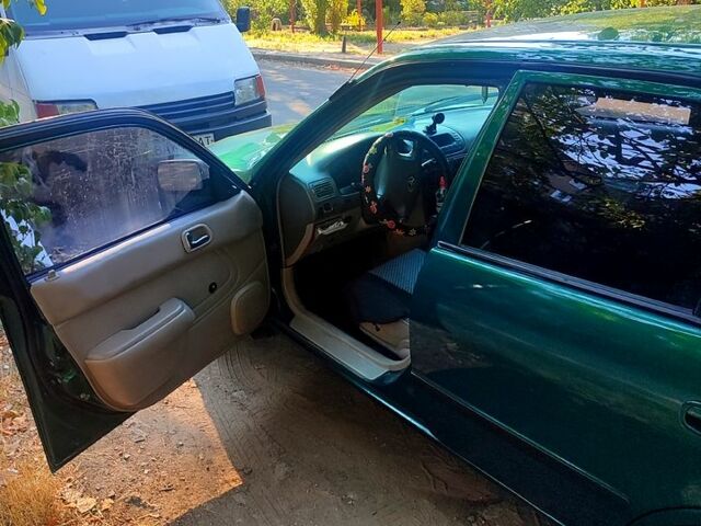 Зелений Тойота Королла, об'ємом двигуна 1.4 л та пробігом 400 тис. км за 4800 $, фото 4 на Automoto.ua