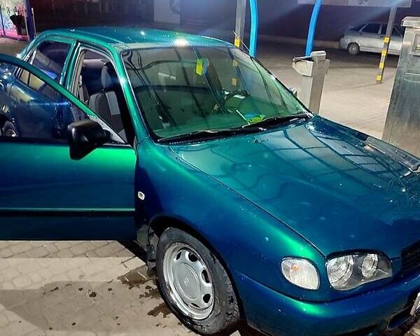 Зеленый Тойота Королла, объемом двигателя 1.4 л и пробегом 400 тыс. км за 4800 $, фото 8 на Automoto.ua