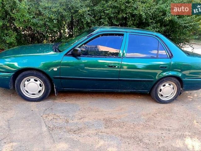 Зеленый Тойота Королла, объемом двигателя 1.4 л и пробегом 400 тыс. км за 4800 $, фото 4 на Automoto.ua