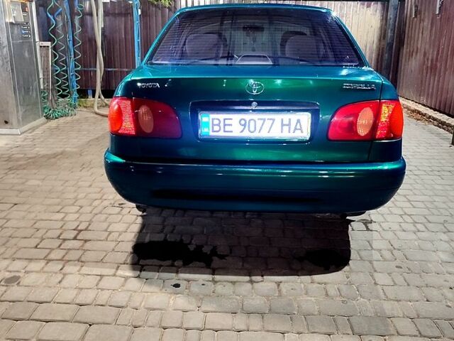 Зеленый Тойота Королла, объемом двигателя 1.4 л и пробегом 400 тыс. км за 4800 $, фото 7 на Automoto.ua