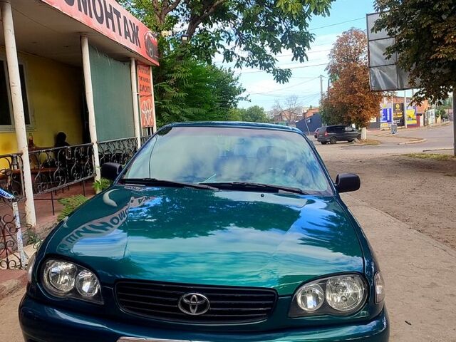 Зелений Тойота Королла, об'ємом двигуна 1.4 л та пробігом 400 тис. км за 4800 $, фото 3 на Automoto.ua