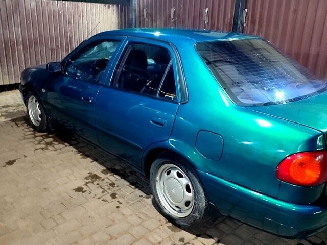 Зеленый Тойота Королла, объемом двигателя 1.4 л и пробегом 400 тыс. км за 4800 $, фото 8 на Automoto.ua