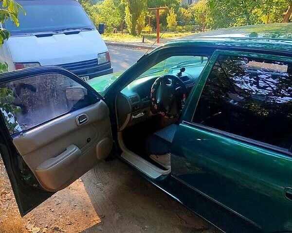 Зеленый Тойота Королла, объемом двигателя 1.4 л и пробегом 400 тыс. км за 4800 $, фото 3 на Automoto.ua