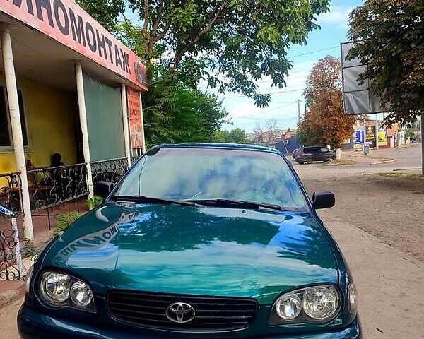 Зеленый Тойота Королла, объемом двигателя 1.4 л и пробегом 400 тыс. км за 4800 $, фото 2 на Automoto.ua