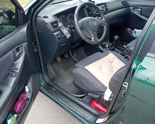 Зеленый Тойота Королла, объемом двигателя 1.6 л и пробегом 370 тыс. км за 4000 $, фото 6 на Automoto.ua