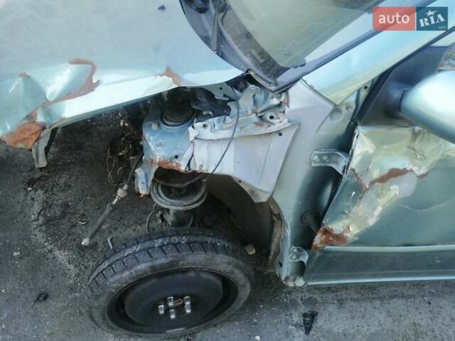 Зеленый Тойота Королла, объемом двигателя 1.8 л и пробегом 100 тыс. км за 600 $, фото 10 на Automoto.ua