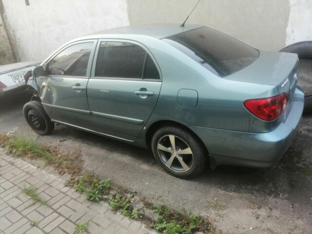 Зелений Тойота Королла, об'ємом двигуна 1 л та пробігом 100 тис. км за 500 $, фото 1 на Automoto.ua