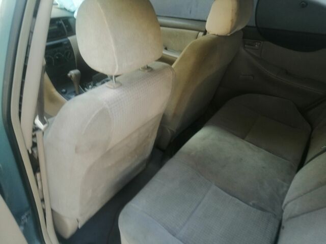 Зелений Тойота Королла, об'ємом двигуна 1 л та пробігом 100 тис. км за 500 $, фото 6 на Automoto.ua